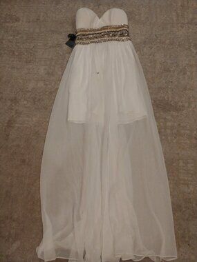 FLAWED but with tags and never worn BEBE with tags flowy gown size 4